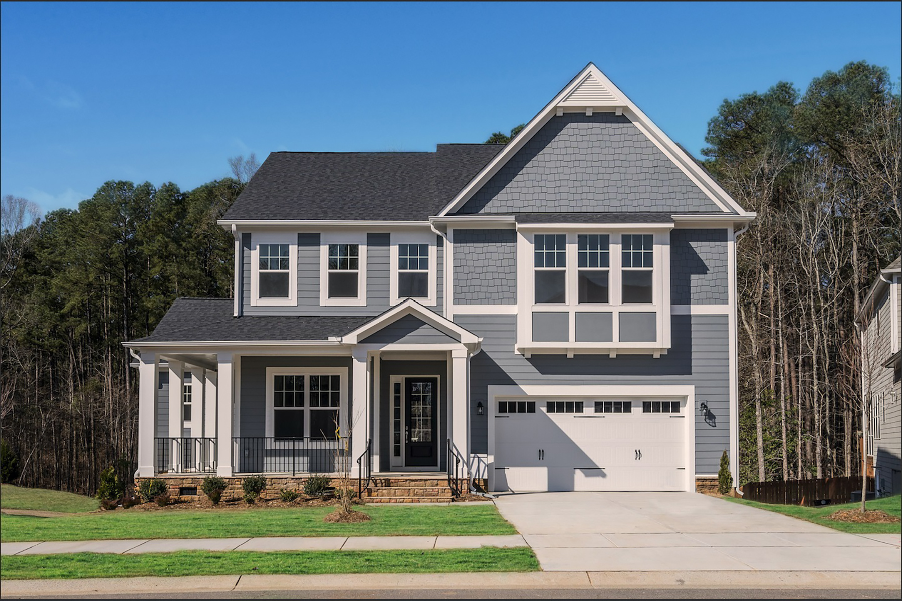 Modern Home With Grey Exterior and Covered Front Porch