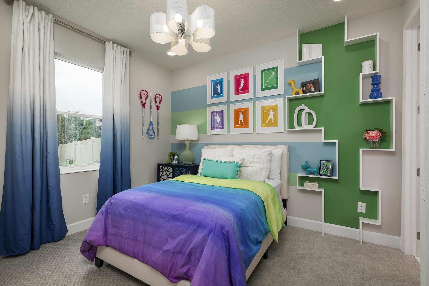 [Colorful Bedroom With Gallery Wall of Pictures Above Bed]