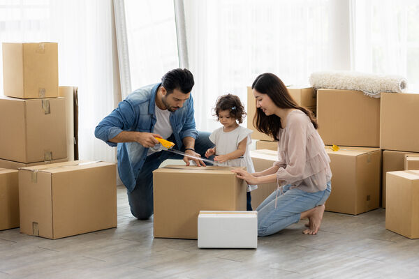 Family with moving boxes