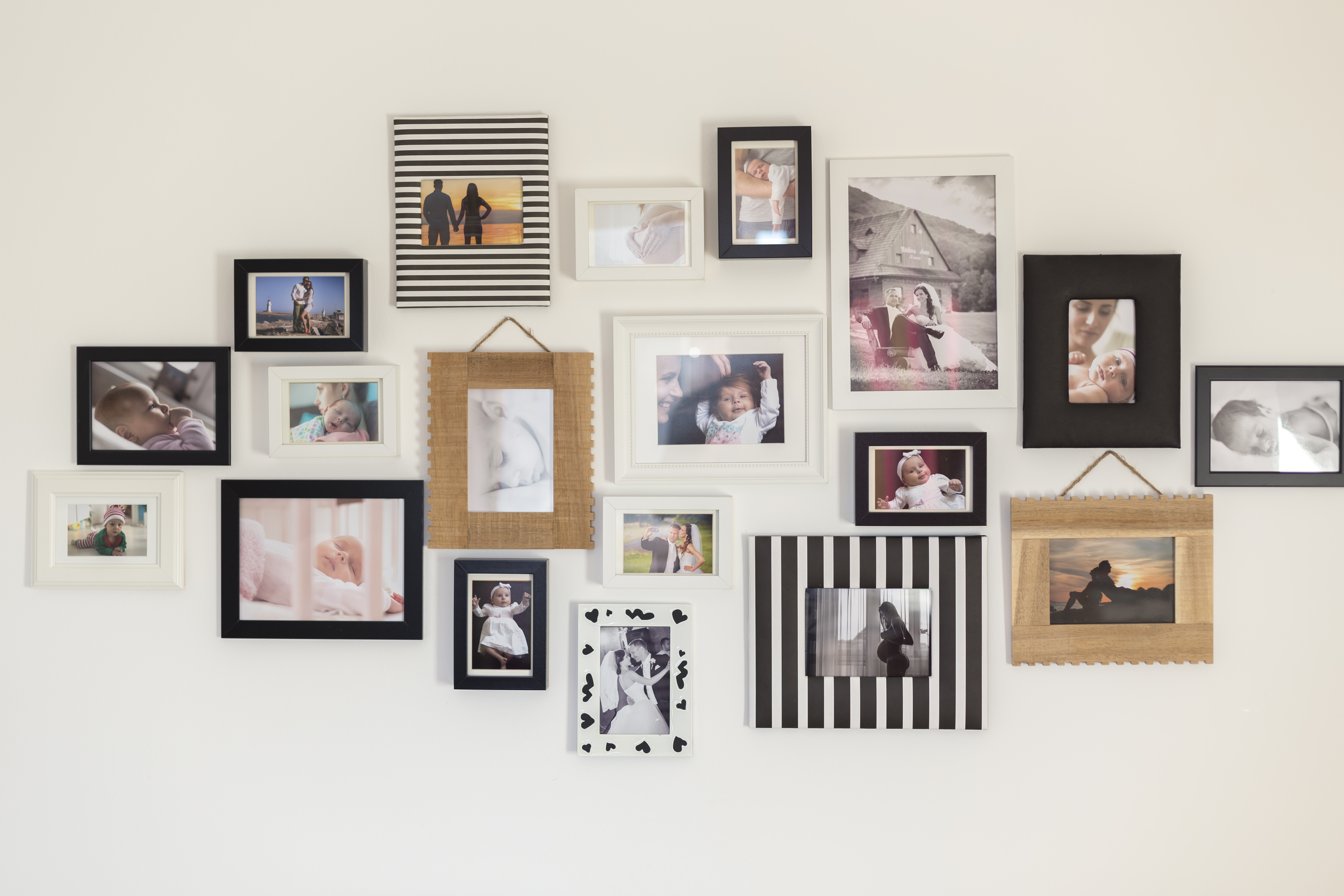 [Wall Gallery of Framed Family Photos]