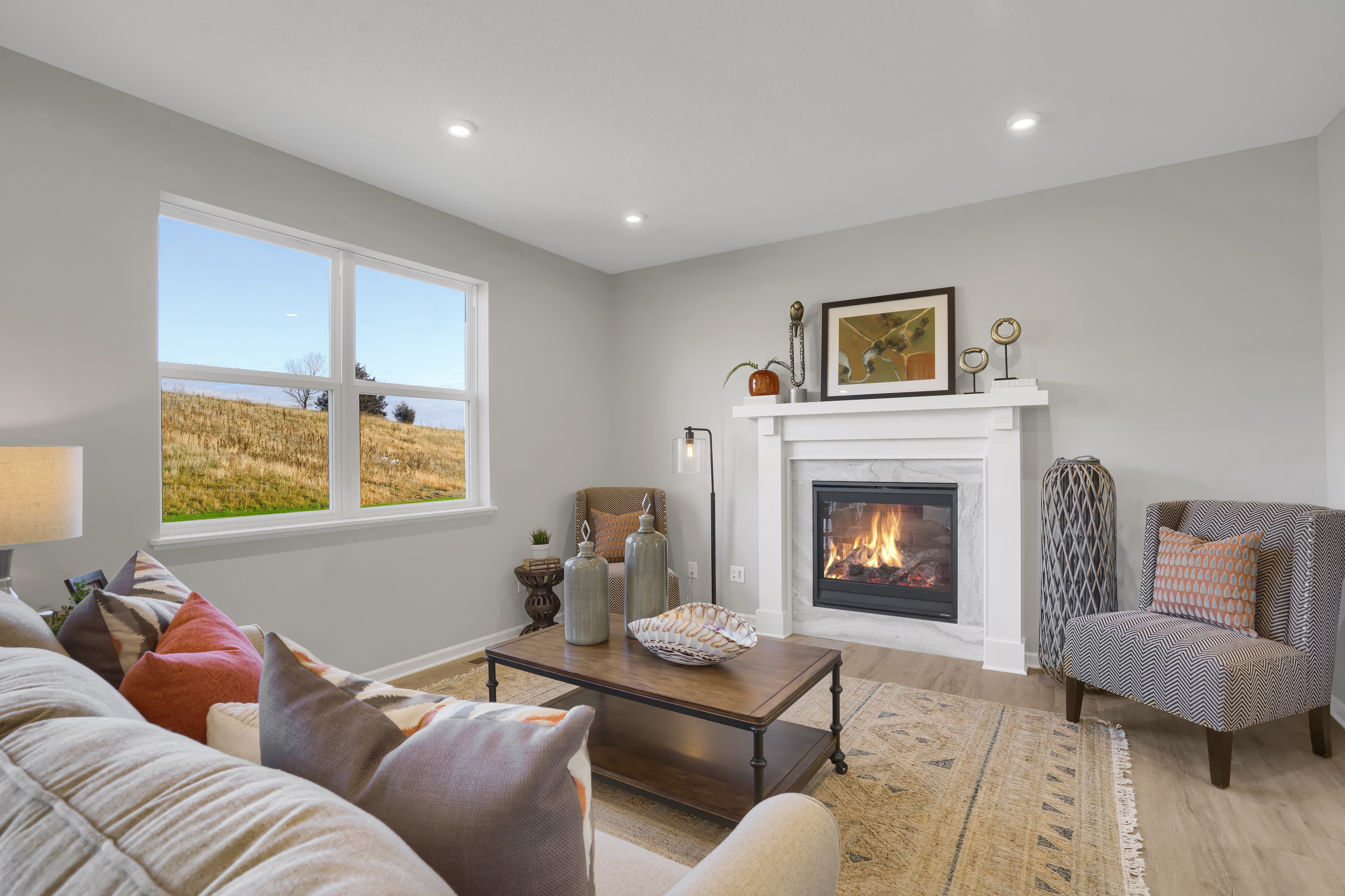 Staged Living Room With Fireplace On