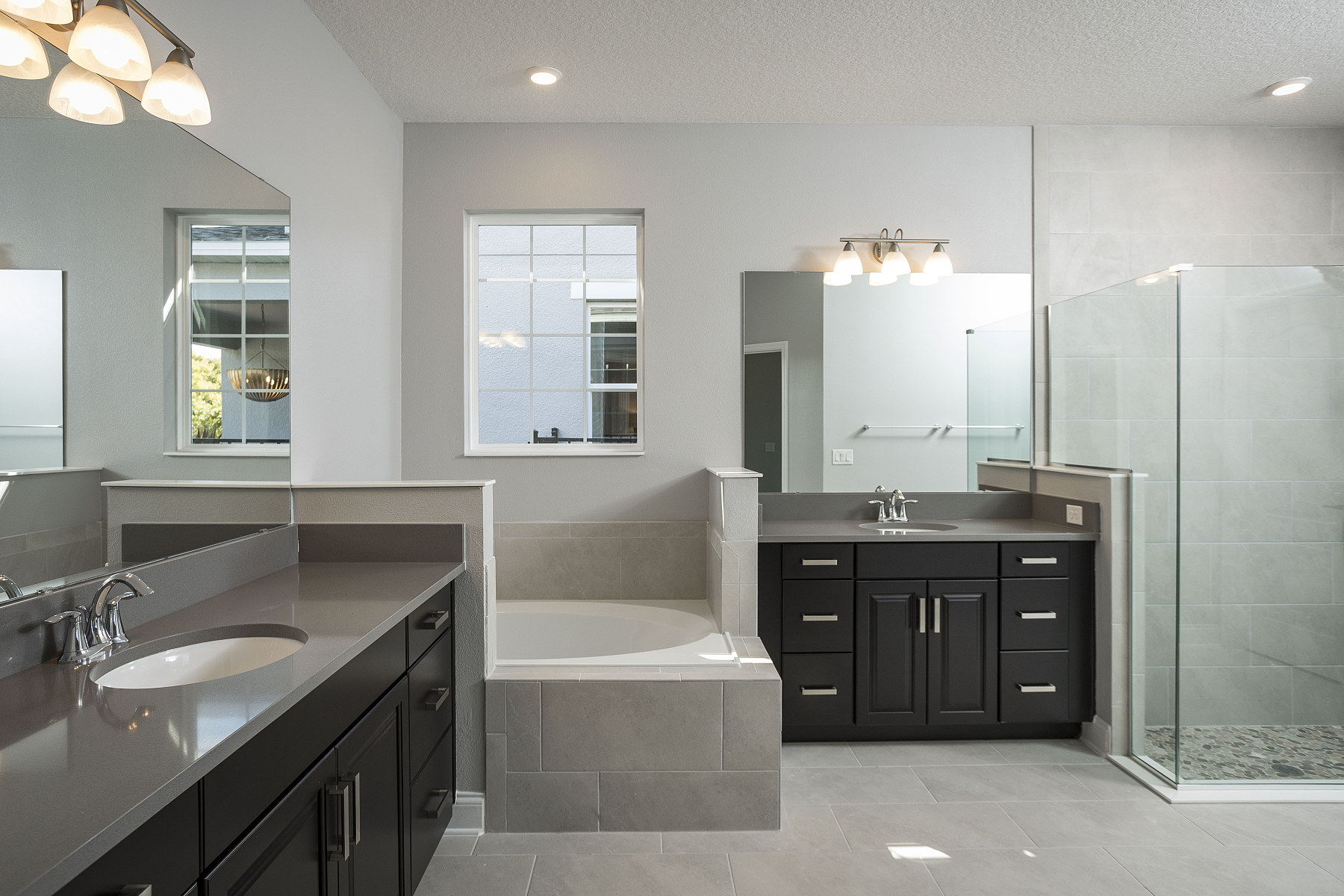 Owner's Bathroom With Soaking Tub and Two Vanities