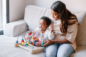 Mom and baby playing