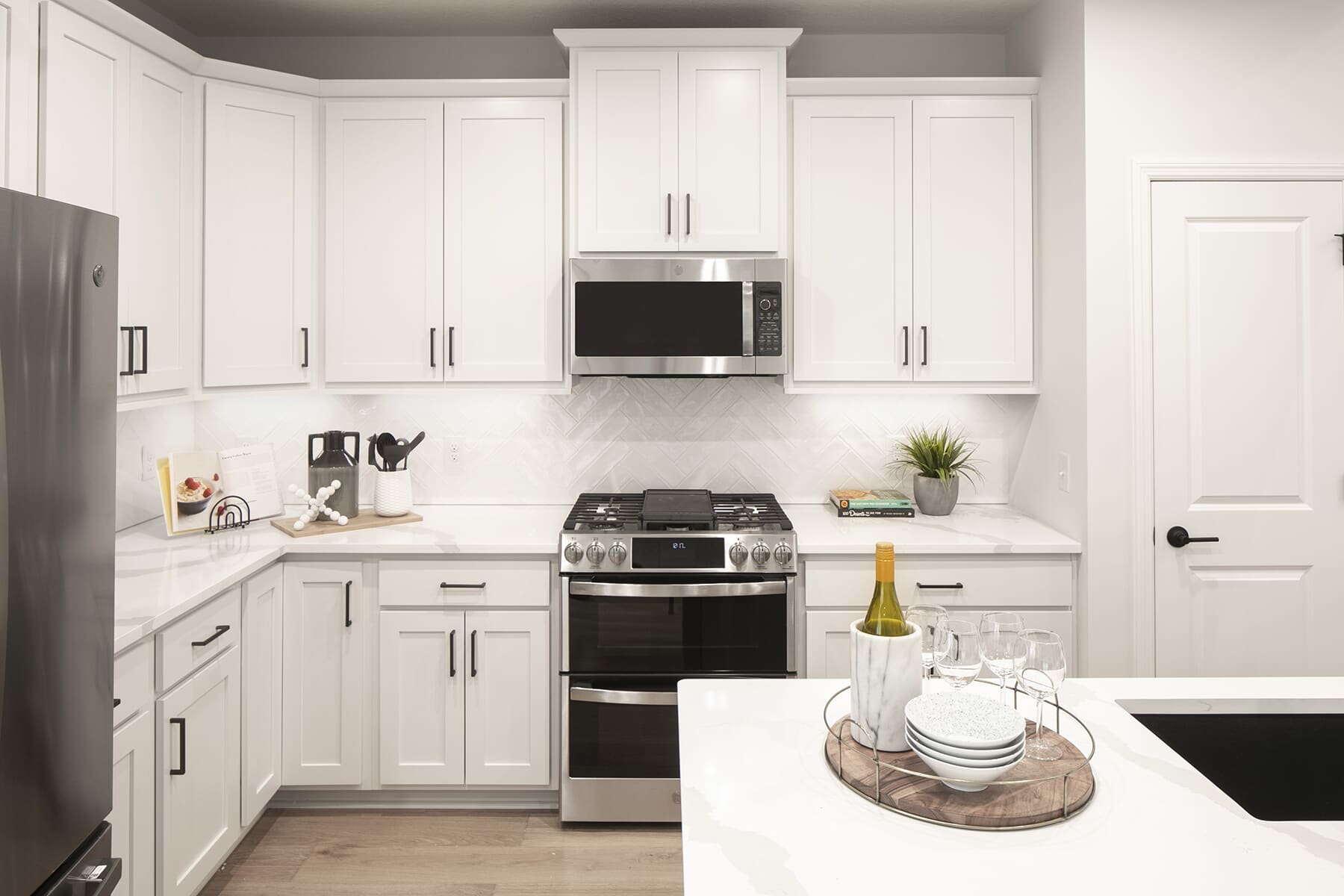 Kitchen Island With Wine Glasses and Bowls