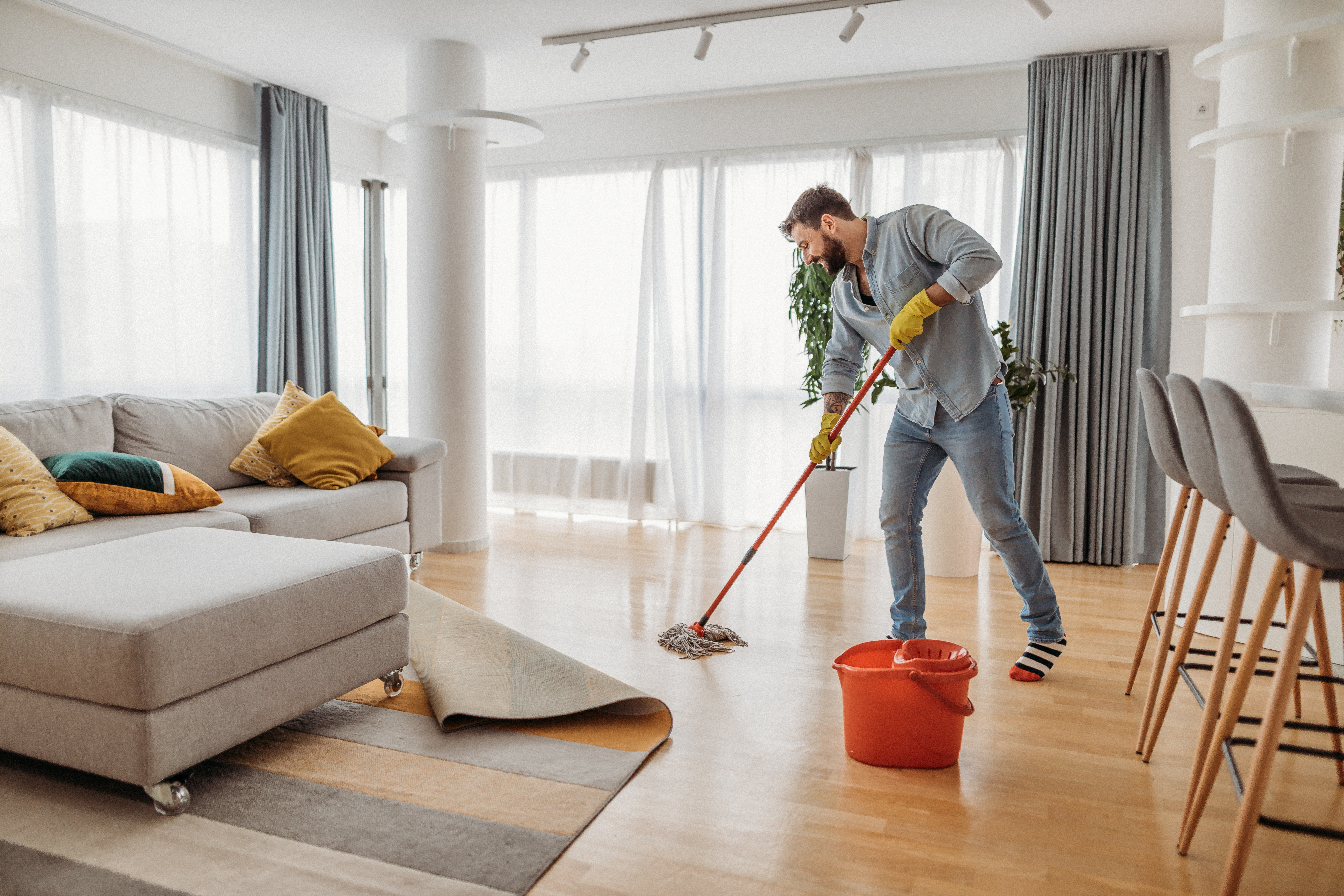 Man Mopping Floors