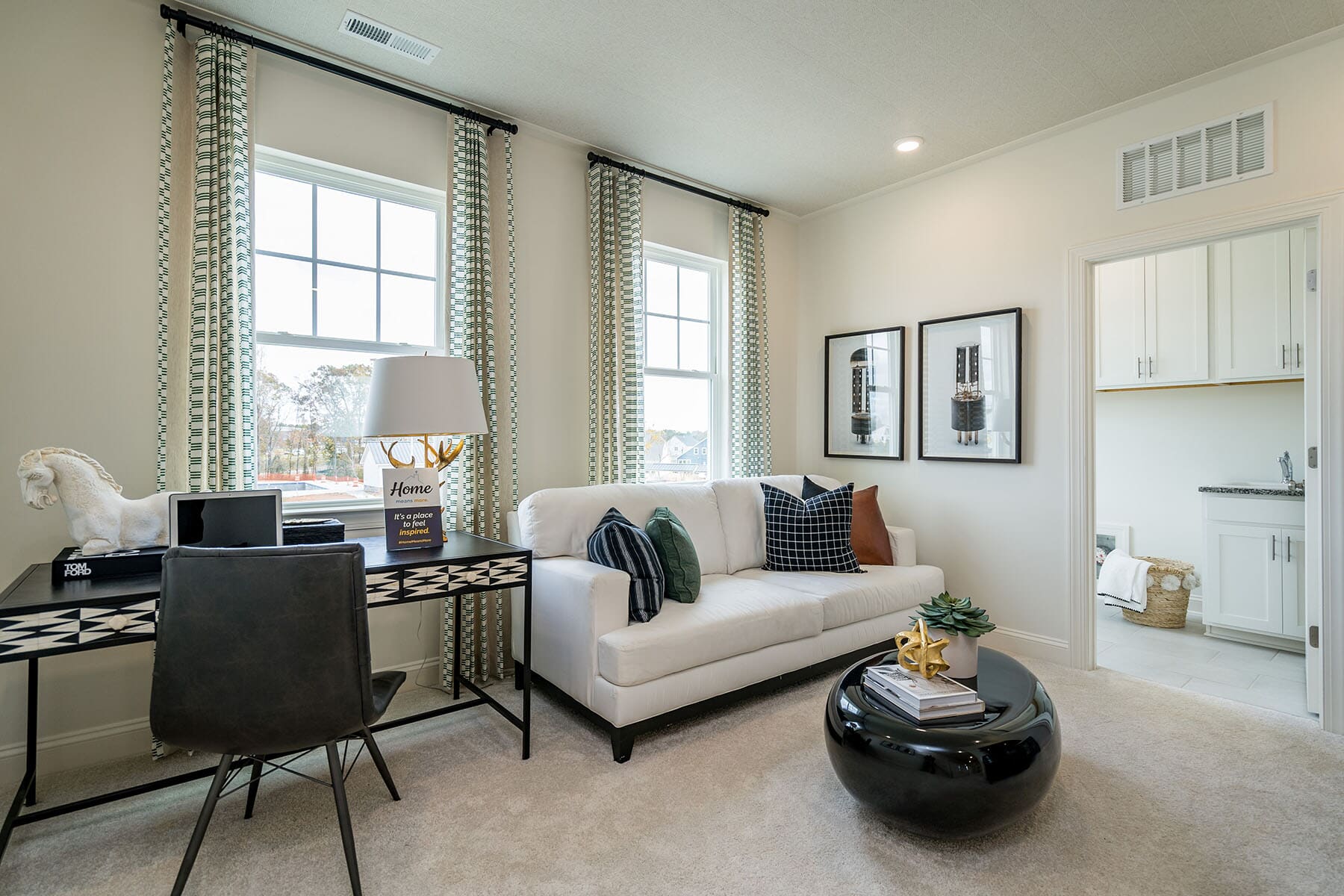 Loft With Desk and Seating Area