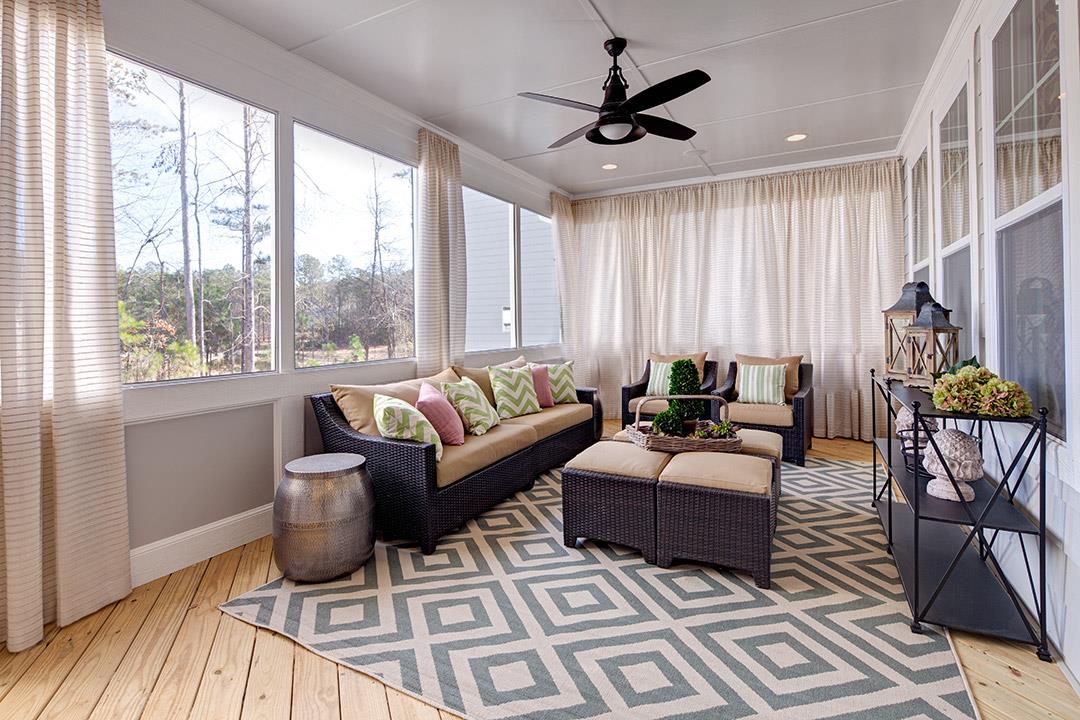 Screened Porch With Subtle Fall Decorations